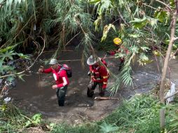 Hallan cuerpo de motociclista arrastrado por la corriente en Tlajomulco