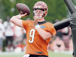 Joe Burrow se encuentra lesionado, pero se espera que aparezca de inicio. AFP