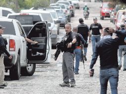Elementos de distintas corporaciones de seguridad están realizando las pesquisas para localizar a los jóvenes desaparecidos en Lagos de Moreno. AFP/U. Ruiz
