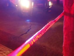 Integrantes del Instituto Jalisciense de Ciencias Forenses acudieron para levantar los cuerpos. EL INFORMADOR / ARCHIVO