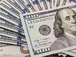 El peso mexicano se cotiza en los mercados internacionales alrededor de los 17.99 pesos. AP/ ARCHIVO