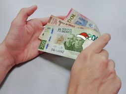 Los trabajadores en México tienen derecho a un aguinaldo anual que deberá pagarse antes del día 20 de diciembre y equivalente a quince días de salario, por lo menos. EL INFORMADOR / O. Álvarez
