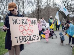 Los rusos participarían en los JO si lo hacen bajo bandera neutra. AFP
