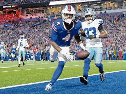 James Cook (#4) corrió para más de 150 yardas y un par de anotaciones. AFP