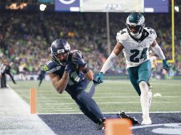 Jackson Smith-Njigba (izq.) hizo la atrapada de la victoria. AFP/S. Chambers