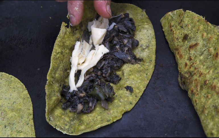 Este icónico producto lácteo puede traerte algunos problemas de salud si lo consumes en grandes cantidades. AFP / ARCHIVO