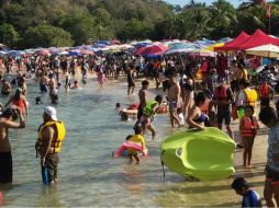 Los trabajadores que se presenten a su empleo el lunes 18 de marzo, se les deberá pagar el triple de su sueldo. SUN/ ARCHIVO.