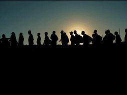 Esta ley permite al estado arrestar y deportar a migrantes que hayan cruzado de manera irregular. AP