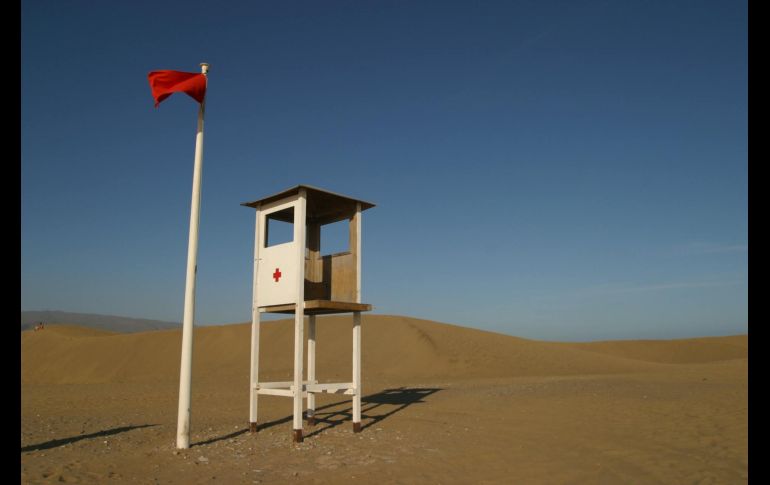 Es importante estar al pendiente de las banderas que las autoridades coloquen para que puedas disfrutar de tu estancia. Pexels