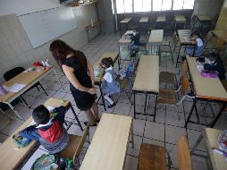 La mayoría de los maestros perciben de uno a dos salarios mínimos, esto equivale a entre siete mil y 14 mil pesos. EL INFORMADOR/Archivo