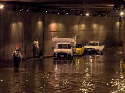 En el Área Metropolitana de Guadalajara hay al menos 30 pasos a desnivel que ante una tormenta se vuelven peligrosos para los habitantes. EL INFORMADOR / ARCHIVO