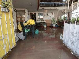 Equipos de Protección Civil acudieron al lugar para apoyar a los afectados en las tareas de limpieza. SUN/ARCHIVO