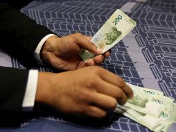 El precio del dólar se alejó un poco tras el anuncio de los nuevos integrantes del próximo gabinete de Claudia Sheinbaum. NOTIMEX / ARCHIVO