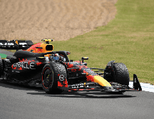 La tensión que hay en torno al piloto tapatío, Sergio Pérez, de Red Bull, crece cada vez más. EFE / P. Powell