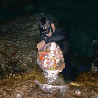 Remueven 25 toneladas de desechos de cenotes en Yucatán