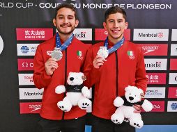 Los clavadistas Kevin Berlín Reyes y Randall Wilars Valdez recibieron el apoyo de las Fuerzas Armadas. AFP/M. Panagiotakis