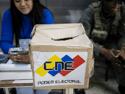 Personal del Consejo Nacional Electoral (CNE) participa en una jornada de información para las elecciones presidenciales de Venezuela. EFE / M. Gutierrez