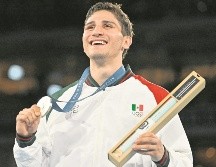 El medallista olímpico en París 2024 tendrá como nuevo mánager a Eddy Reynoso. AFP/ ARCHIVO.