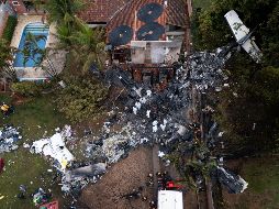 Los rescatistas realizaron labores sin descanso para recuperar los cuerpos. EFE/I. Fontana