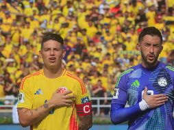 James Rodríguez y Camilo Vargas. El delantero anotó un gol y dio una asistencia, aunque también propició el gol argentino. EFE/R. Maldonado