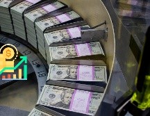 Los recortes de las tasas de interés de la Fed deberían, con el paso del tiempo, disminuir los costos de préstamos para hipotecas, para automóviles y tarjetas de crédito. AFP / ARCHIVO