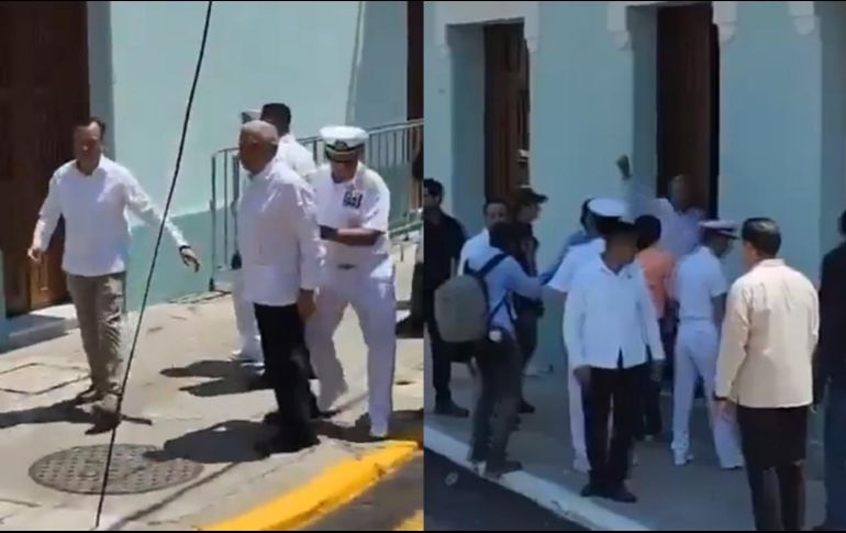 El mandatario ingresaba al lugar acompañado del gobernador Cuitláhuac García, y el secretario de la Marina, José Rafael Ojeda Durán, alcanzó a esquivar la botella que le fue lanzada desde la acera donde los empleados exclamaban consignas 
