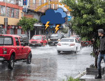 Las lluvias pronosticadas podrían estar acompañadas con descargas eléctricas y con posible caída de granizo en zonas del interior del país. SUN / ARCHIVO