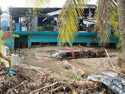 Colonias y cosechas siguen inundadas, a una semana de la llegada de John. AFP
