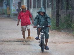 Las lluvias fuertes a torrenciales podrían ocasionar encharcamientos, inundaciones y deslaves, así como incrementar los niveles de ríos y arroyos. EFE / ARCHIVO