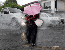 Las lluvias fuertes podrían ocasionar encharcamientos, inundaciones y deslaves. NTX / AP / ARCHIVO