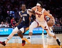 Jaime Jáquez Jr. ataca la canasta durante un partido de pretemporada de la NBA. ARCHIVO / AP Foto