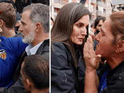 Ante la indignación de la gente, los escoltas actuaron rápidamente creando un cordón de seguridad en torno a los visitantes reales. EFE / B. ALIÑO / A. ESCOBAR