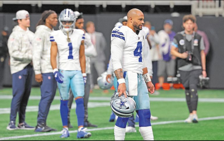 Prescott sufrió una lesión muscular que lo sacó del juego ante Atlanta. AFP/K. Cox