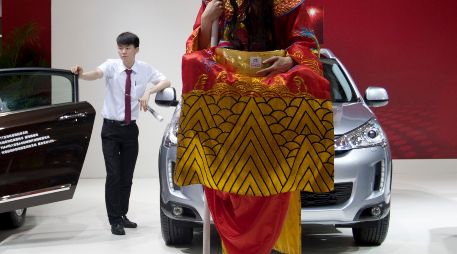 La rápida popularidad de las marcas chinas a forzado cambios en toda la cadena de la industria. AP/Archivo