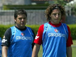 Daniel Guzmán y Andrés Guardado, durante un entrenamiento del Atlas en el primer semestre de 2006. EL INFORMADOR/Archivo