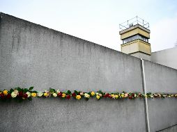 La caída del Muro, símbolo de la Guerra Fría y la división entre el bloque occidental y el soviético, allanó el camino para el colapso del comunismo en Europa del Este y la reunificación de Alemania un año después. AFP / T. Schwarz