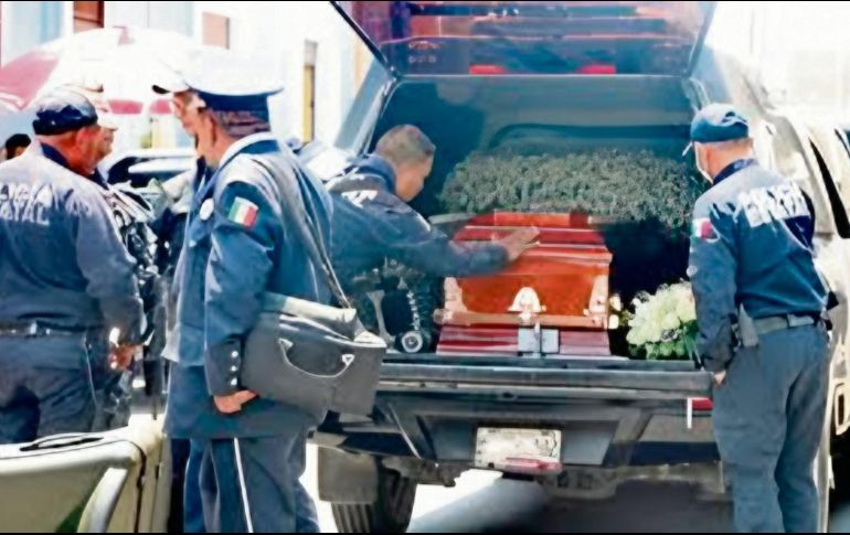 Policías de Puebla, en el sepelio de un compañero. ESPECIAL