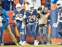 Ja’Quan McMillian (#29) le puso cerrojazo al juego con una intercepción devuelta a las diagonales. AP