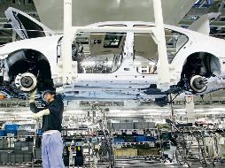 La empresa japonesa busca conservar su papel en el mercado uniéndose con Honda. AFP