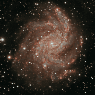 Descubren por accidente la galaxia espiral ultramasiva más lejana del universo