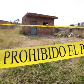 ¿Dónde se localiza la fosa clandestina que contenía 24 cuerpos?