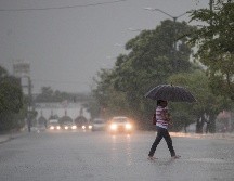 Las lluvias de más intensidad podrían venir con descargas eléctricas; generar encharcamientos, deslaves e inundaciones en zonas bajas. EFE / ARCHIVO