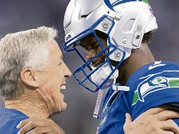 Geno Smith (der.) y Pete Carroll se reencontrarán en Las Vegas. AFP/R. Jenkins