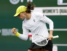 Iga Swiatek es la primera jugadora en clasificar por cuatro veces consecutivas a las semifinales del torneo. EFE/J. Mabanglo