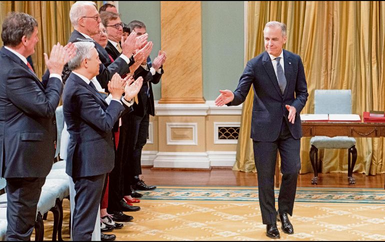 Su regreso a la política canadiense fue promovido por Justin Trudeau, quien inicialmente buscaba sumarlo como titular de Finanzas. Hoy es el primer ministro. EFE