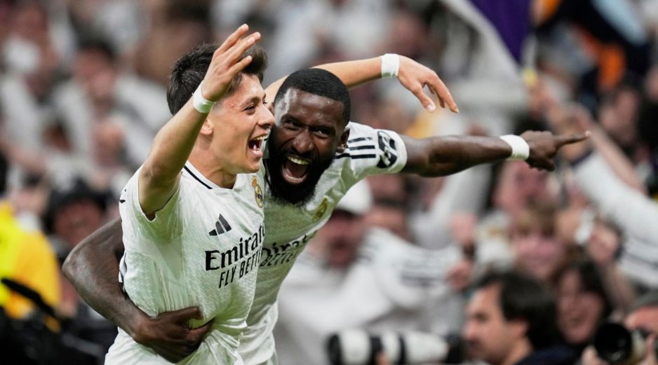 Arda Guler y Antionio Rudiger celebran la remontada. AP/B. Armangue