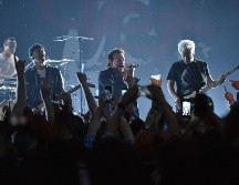 Una de las características más definitorias de U2 es su capacidad para fusionar lo personal con lo político. AP / ARCHIVO