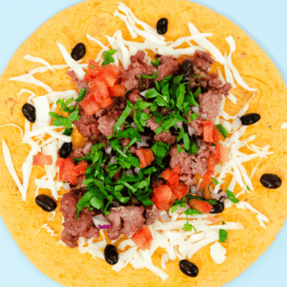 ¿Qué significa tlayuda y por qué se le llama así al manjar oaxaqueño?