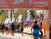 Isabel Oropeza Vázquez y Fernando Crisóstomo Olivares ocuparon los primeros puestos en el podio de la 36ª edición del Medio Maratón de Zapopan. EL INFORMADOR/H. FIGUEROA