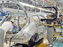 La industria automotriz mexicana saldrá mejor librada de los impuestos estadounidenses. AFP